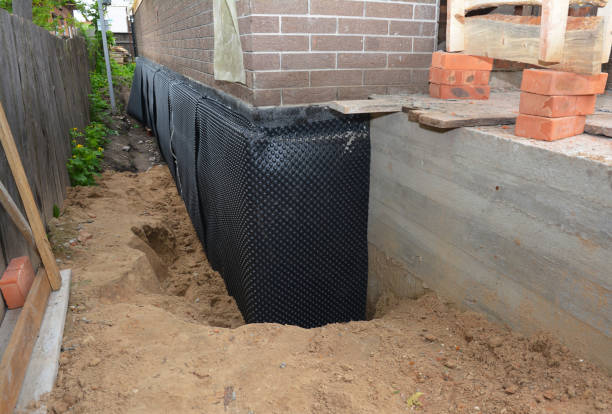 Happy homeowners after waterproofing job in Saginaw